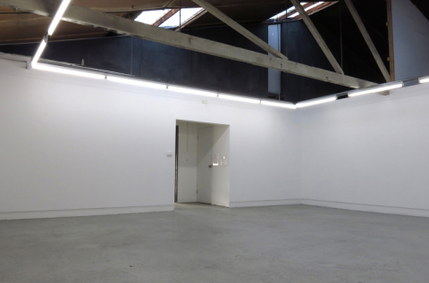 Open shared studio space which is marked out for three studios