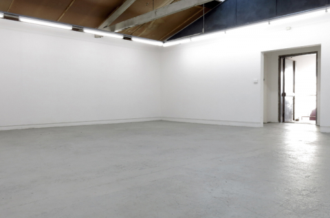 Open shared studio space which is marked out for three studios