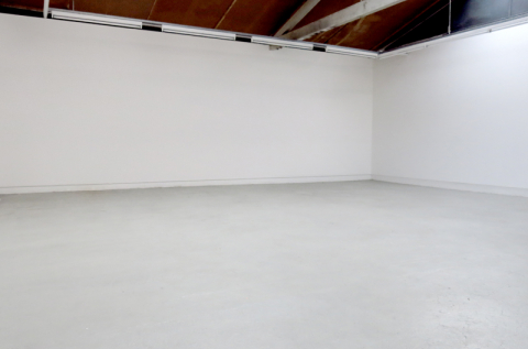 Open shared studio space which is marked out for three studios