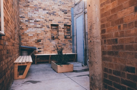 The rear courtyard with bbq and outdoor seating 