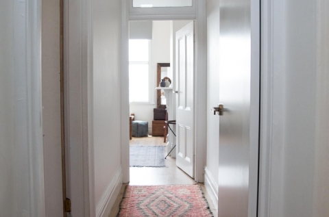 Hallway between rooms o flight filled space